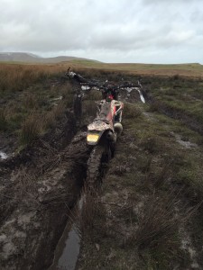 A motorbike seized for illegal off-roading, photo shows the damage the activity causes to the landscape.