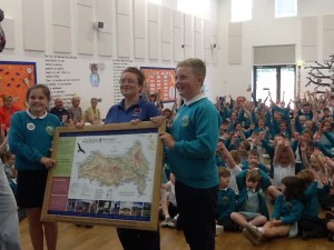 Ysgol Bro Tawe receiving their award and map board.