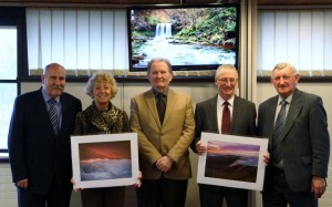 Councillor Geraint Hopkins, Councillor Glynog Davies and Councillor Evan Morgan present Mrs Julie James and Mr Martin Buckle with leaving gifts. © Brecon Beacons National Park Authority